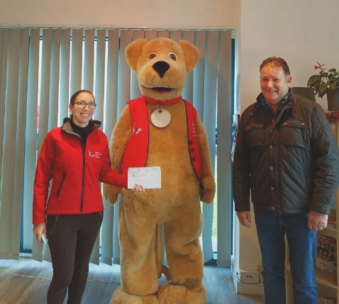 Clara from Autism Assistance Dogs Ireland with Paul Cronin, Commercial Director at Carbon Group
