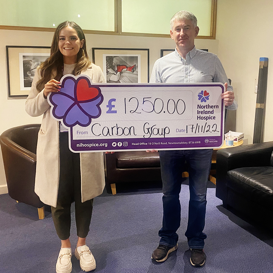 Carbon Group presents a donation cheque to NI Hospice