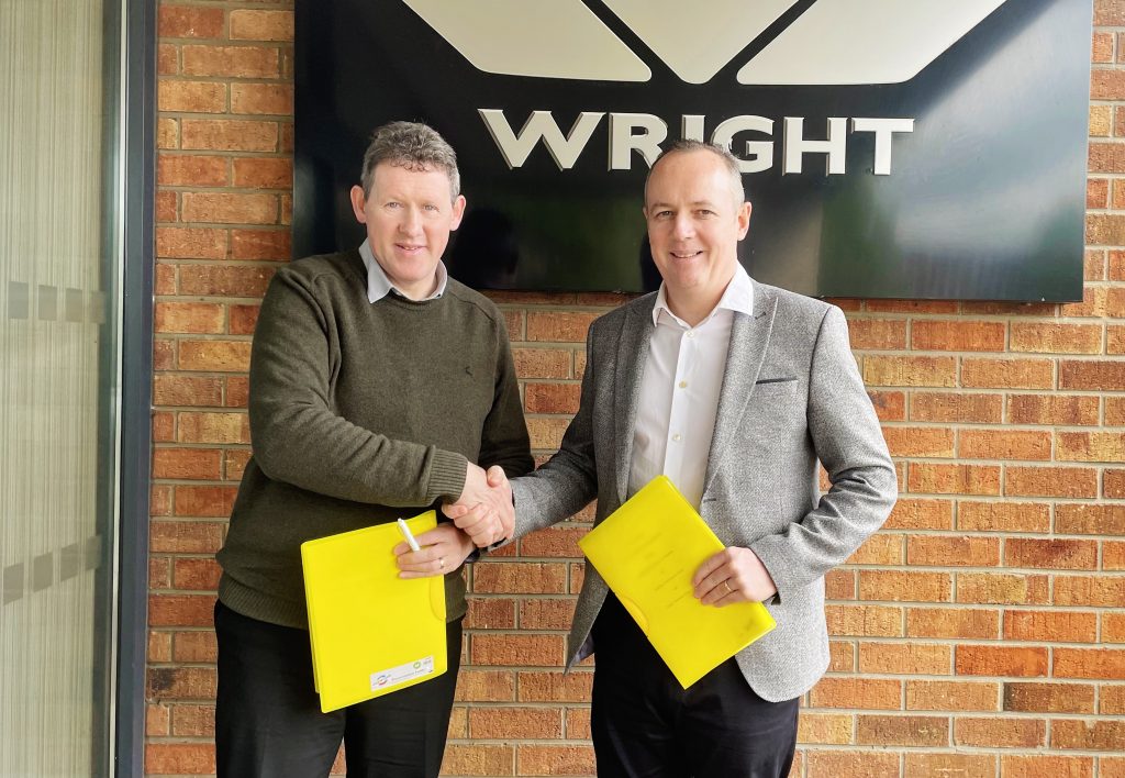 Joe McBride, Tactical Purchasing Specialist at The Bamford bus company t/a Wrightbus with Brian Walsh, Managing Director, Carbon Group.
